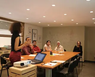 Meeting in progress with a presentation.